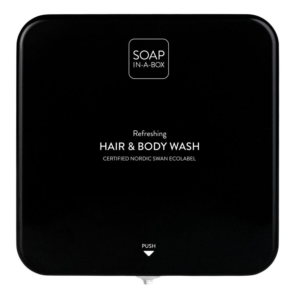 Svart Soap In A Box-dispenser, front med präglad text Hair & Body Wash